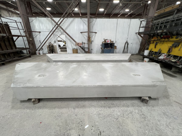 Large precast concrete ballast plates inside the manufacturing plant