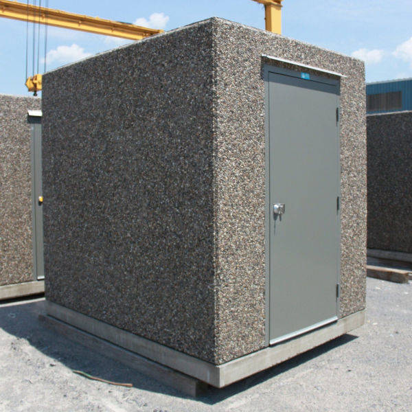 Single-door precast concrete service building with an exposed-aggregate exterior